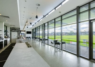 inside of sporting complex building with suspended ceilings